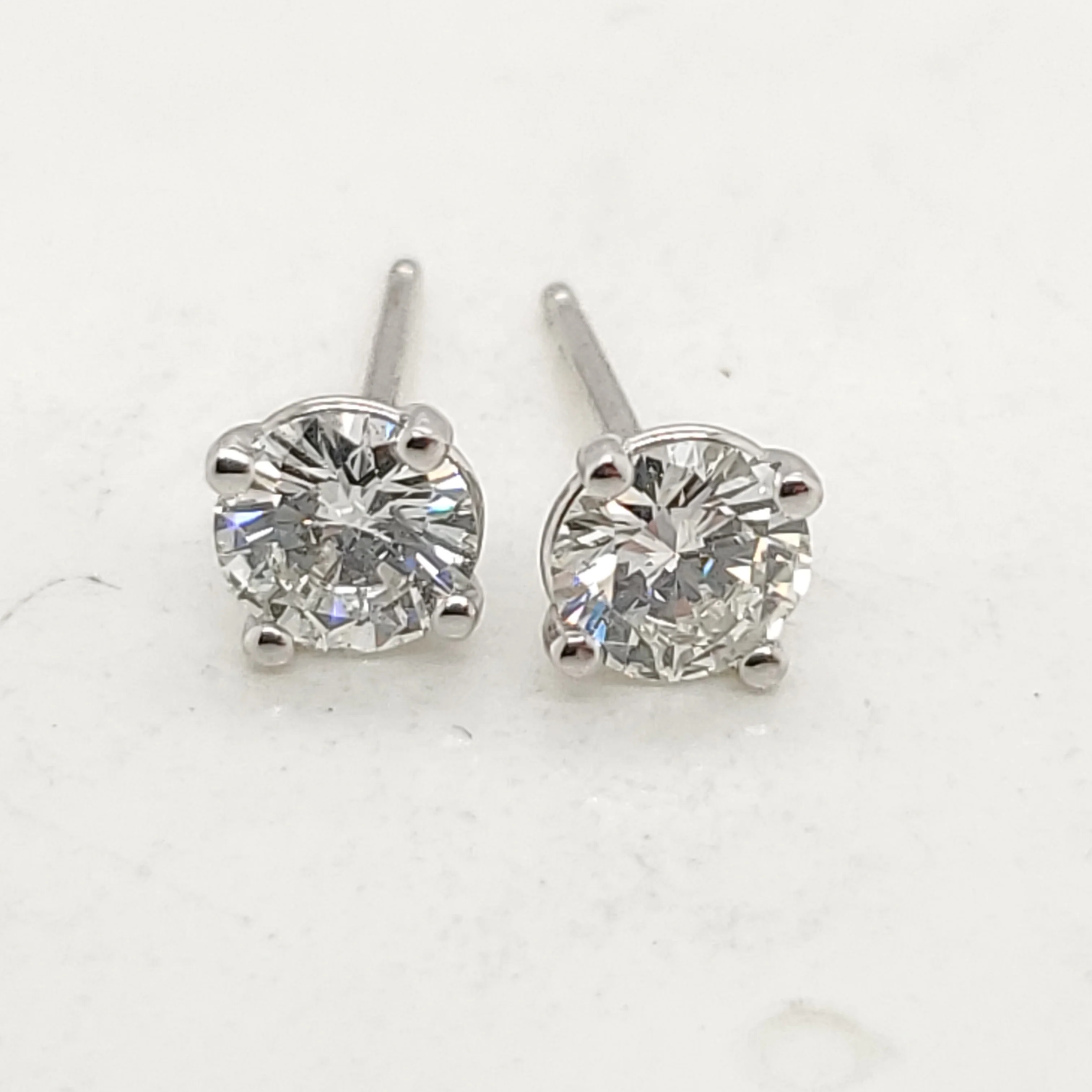 .71 Carat Total Weight Round Diamond Stud Earrings