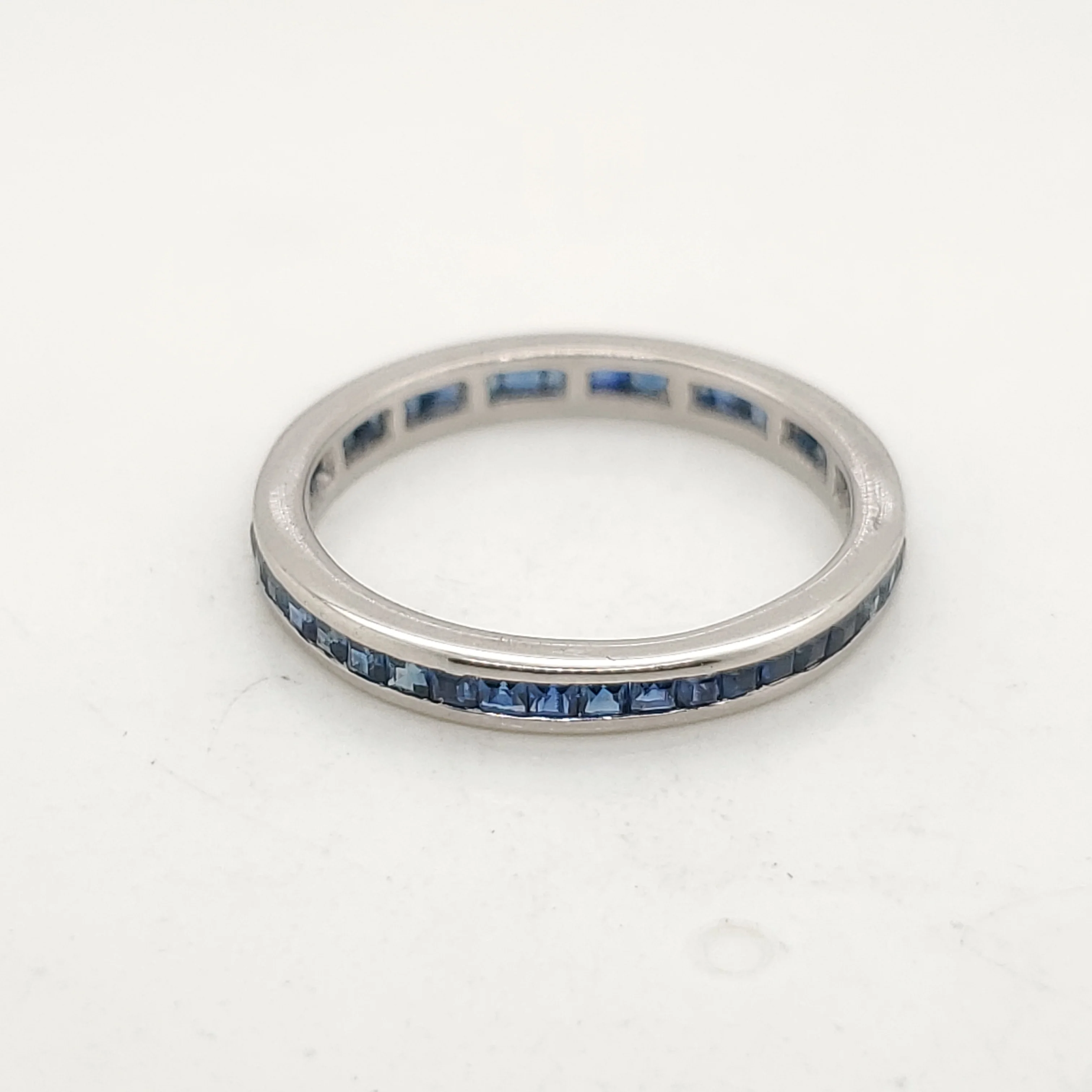 Platinum Sapphire Eternity Style Wedding Band