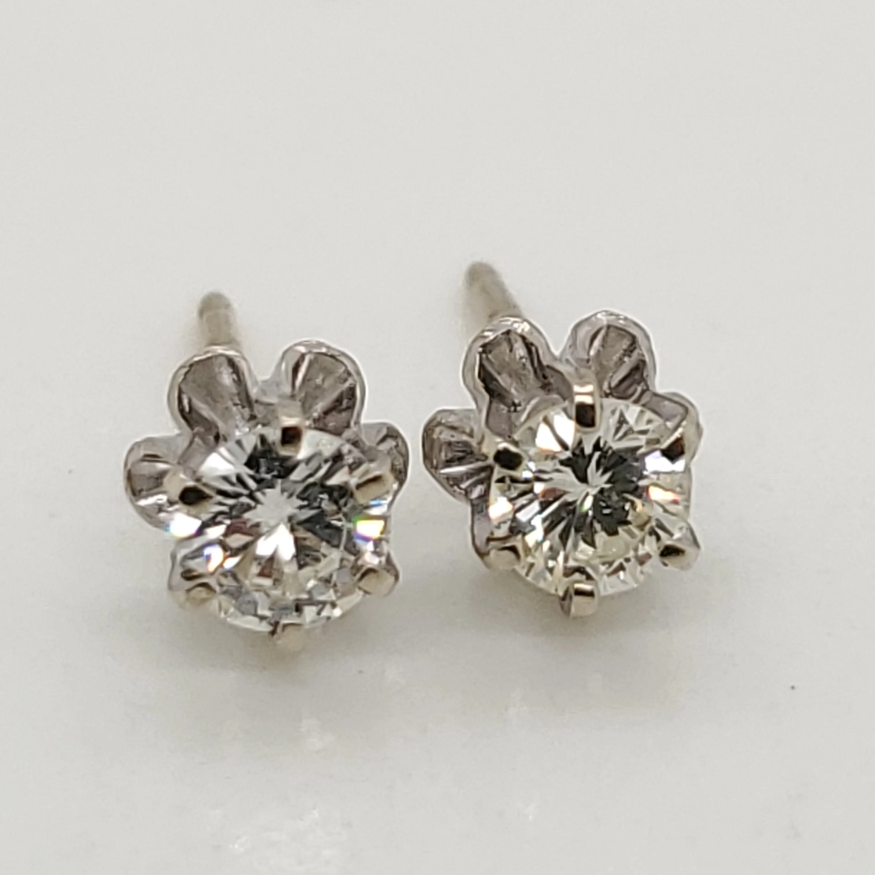 Vintage .50 carat total weight diamond buttercup earrings